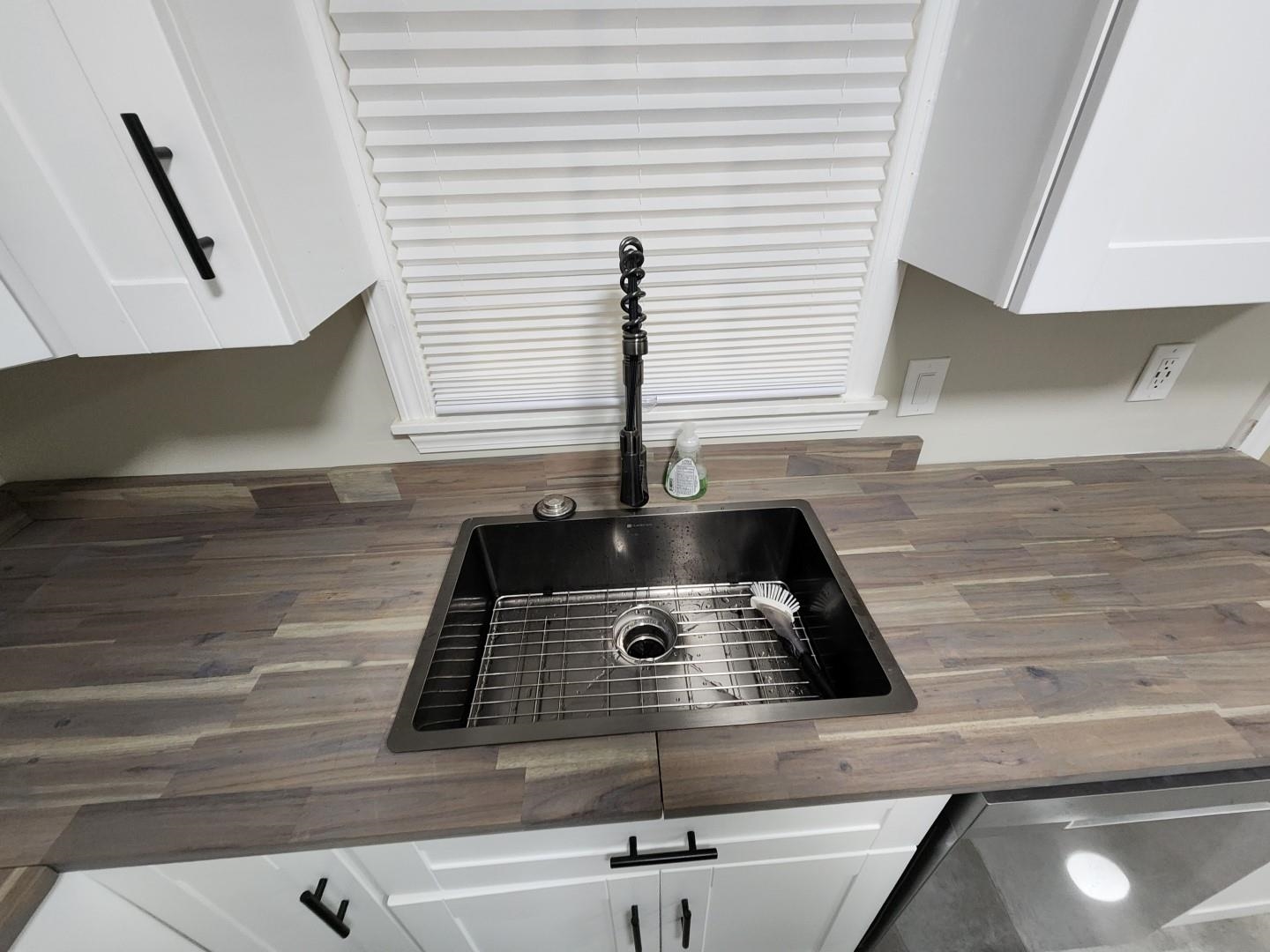 5259 Sequoia Road Memphis, TN 38120 - Photo 10 of 36 a stove top oven sitting inside of a kitchen