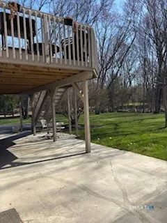 a view of kitchen with stainless steel appliances cabinets