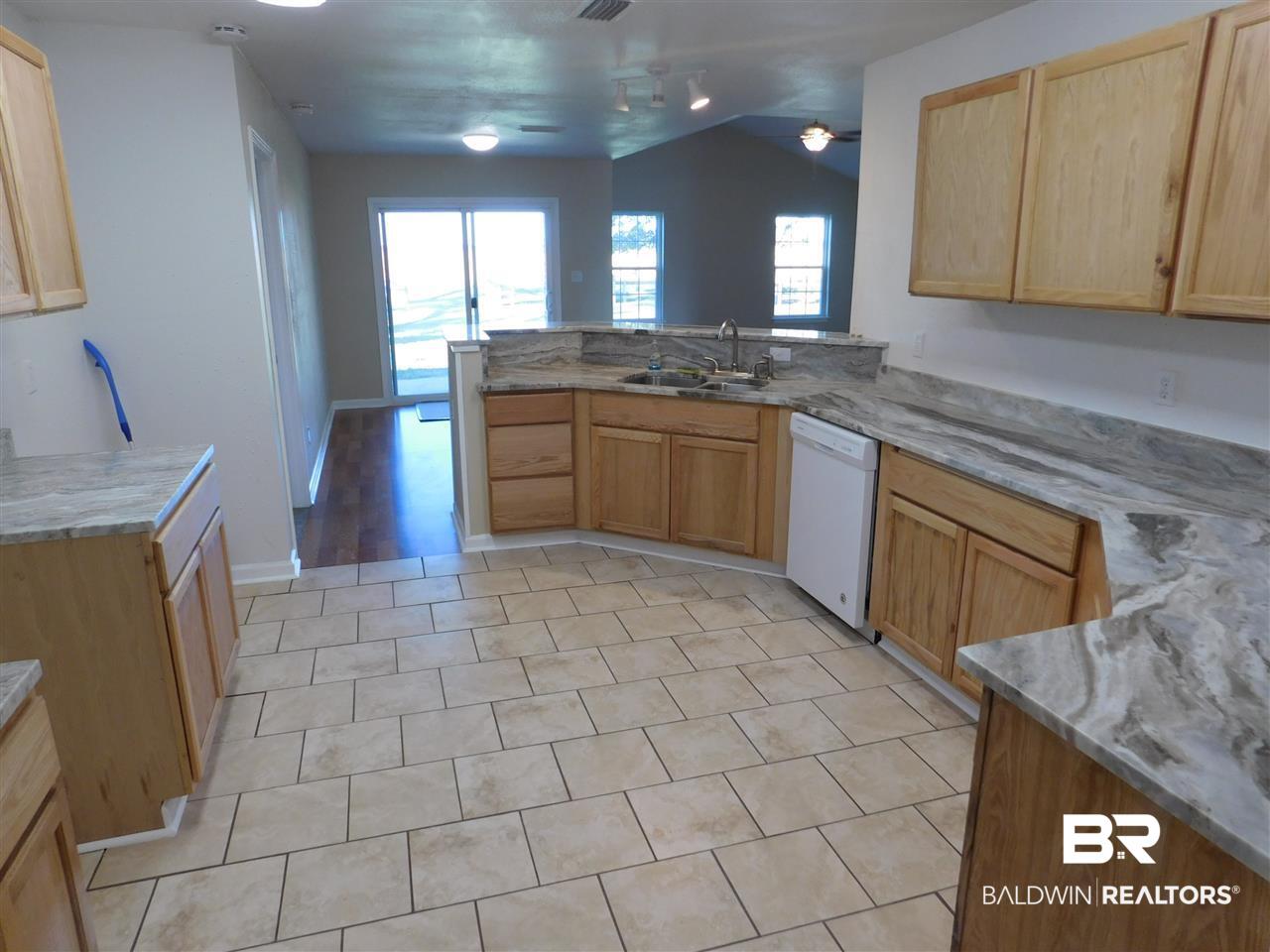 16615 Cold Mill Loop Foley, AL 36535 - Photo 6 of 13 Looking from the laundry / pantry