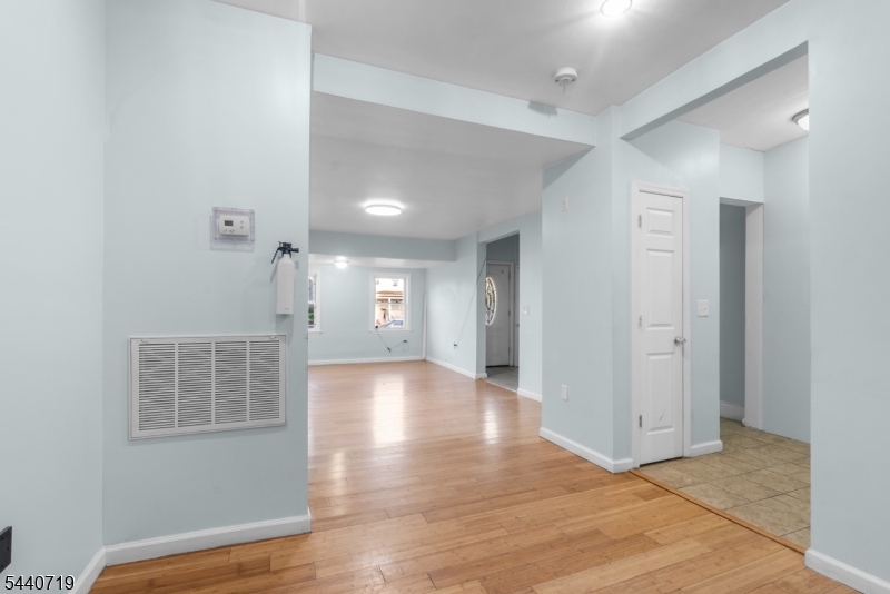 136 Smith Street Elizabeth, NJ 07201 - Photo 15 of 38 a view of livingroom with hardwood