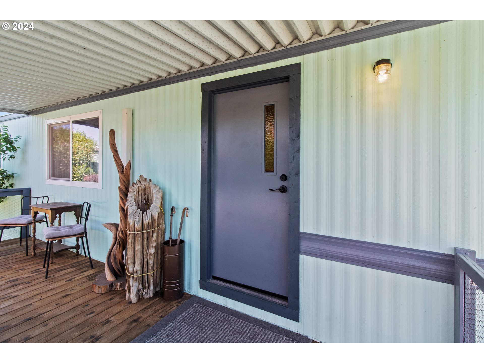 1400 Candlelight Drive, Unit 185 Eugene, OR 97402 - Photo 14 of 46 a view of a hallway with wooden floor and stairs
