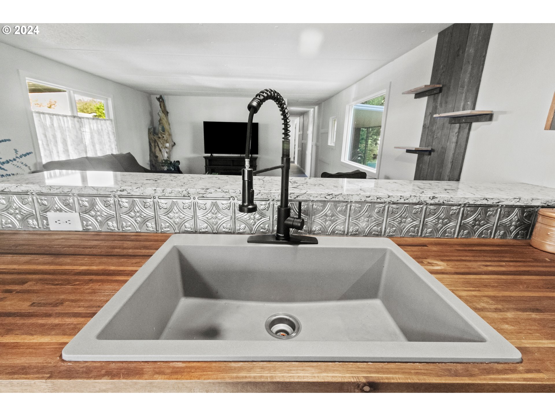 1400 Candlelight Drive, Unit 185 Eugene, OR 97402 - Photo 22 of 46 a view of kitchen sink with cabinets