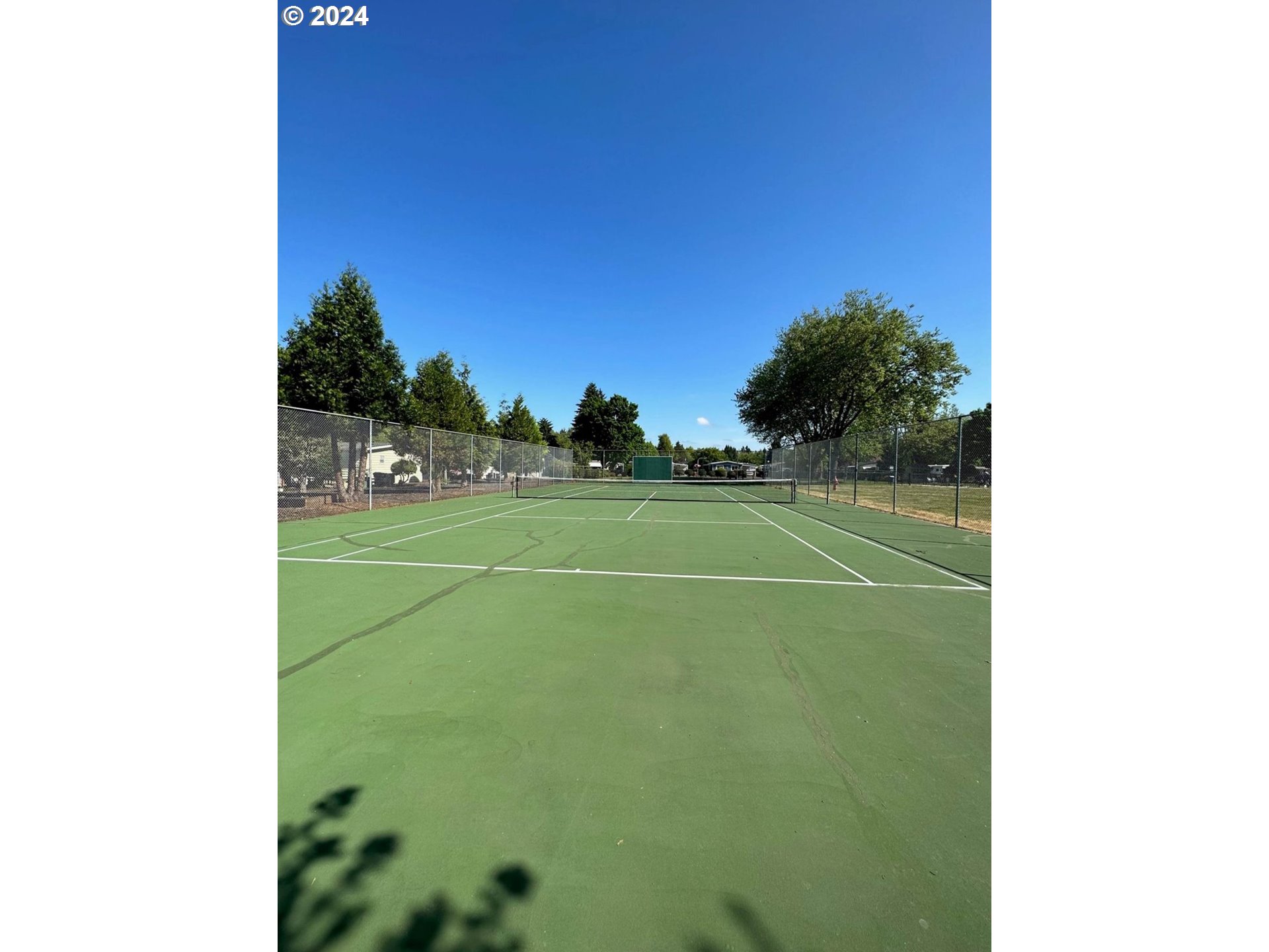 1400 Candlelight Drive, Unit 185 Eugene, OR 97402 - Photo 41 of 46 a view of a tennis court