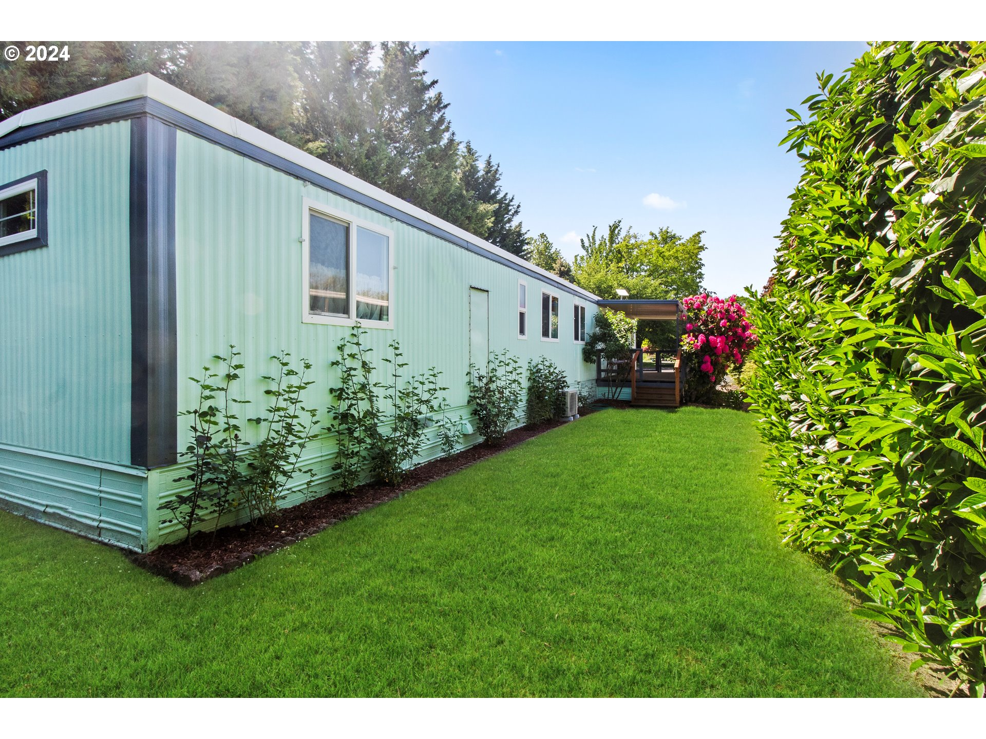 1400 Candlelight Drive, Unit 185 Eugene, OR 97402 - Photo 9 of 46 a view of a back yard with green space