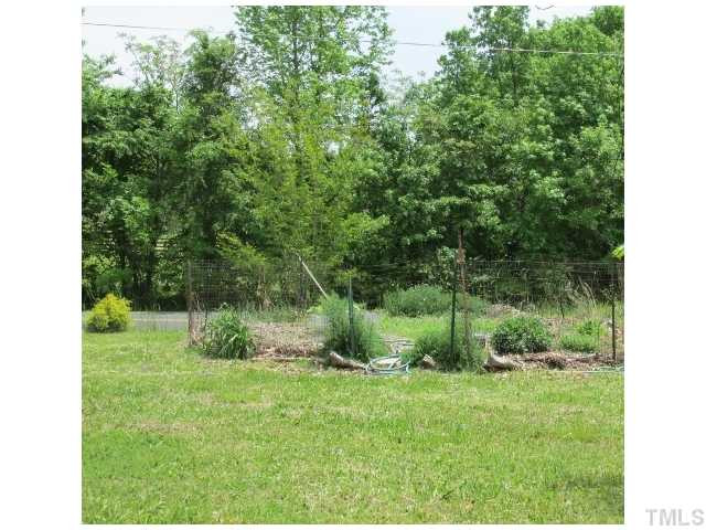 1923 Shaw Road Durham, NC 27704 - Photo 16 of 17 a view of backyard with green space