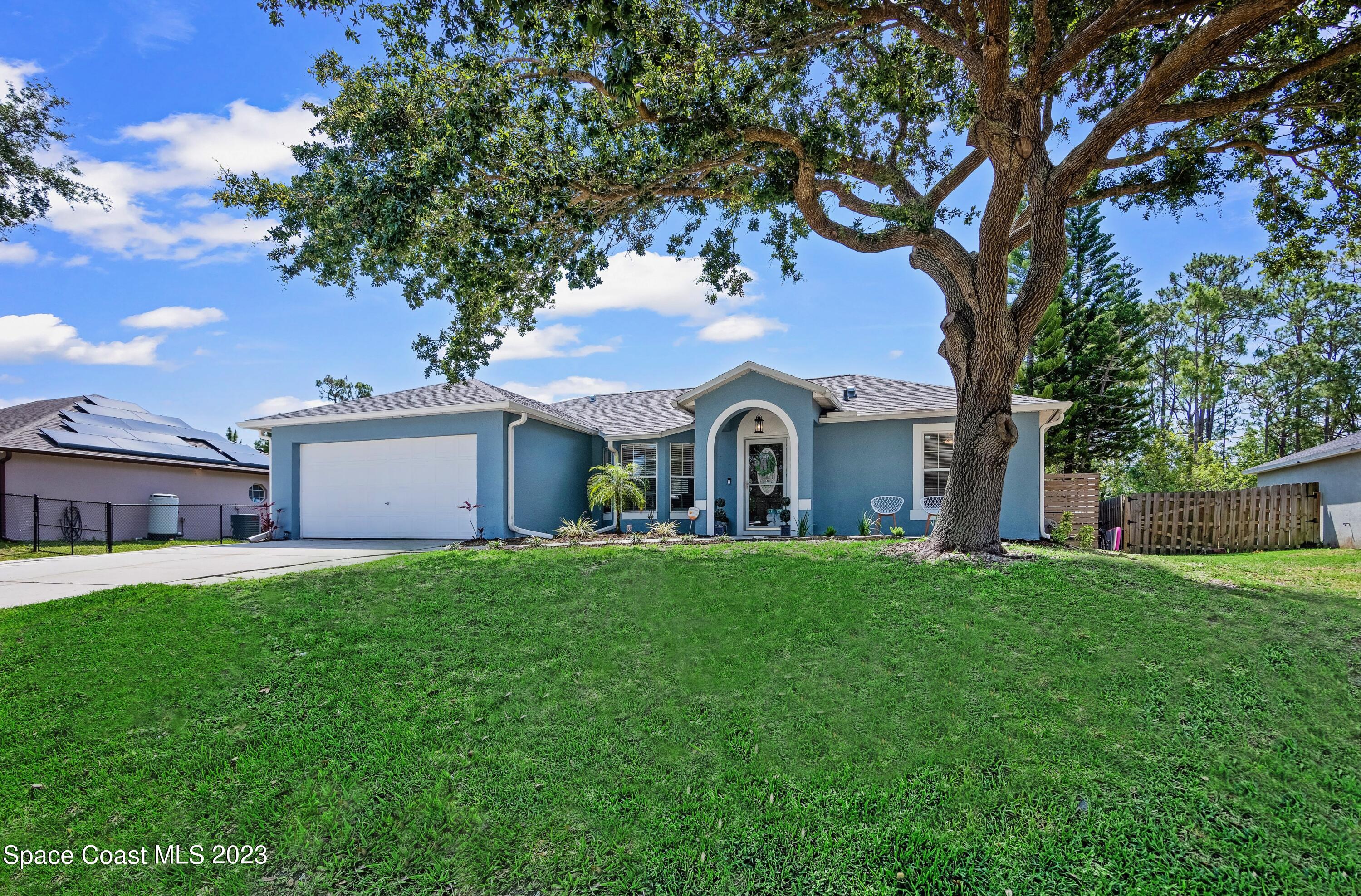 1250 Ragen Road Southeast Palm Bay, FL 32909 - Photo 2 of 25 PIC 2 FRONTSIDE