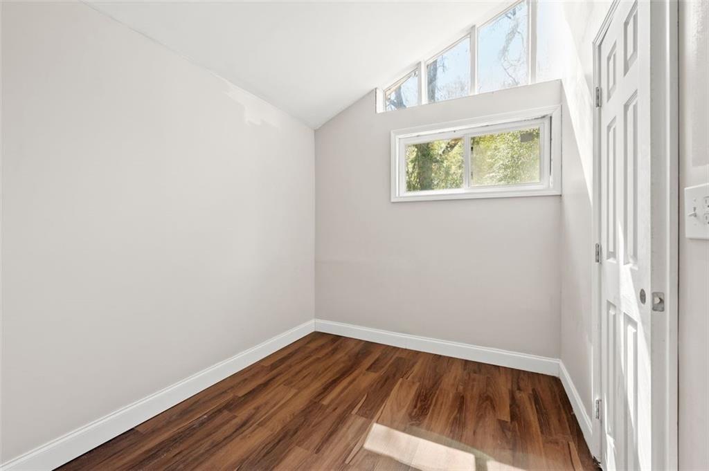 3480 Hogan Road Southwest Atlanta, GA 30331 - Photo 13 of 25 a view of small space with wooden floor and a window