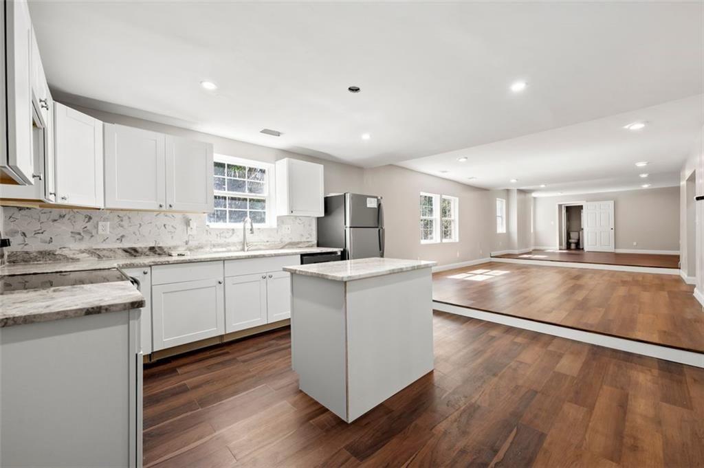 3480 Hogan Road Southwest Atlanta, GA 30331 - Photo 6 of 25 a kitchen with counter top space and appliances