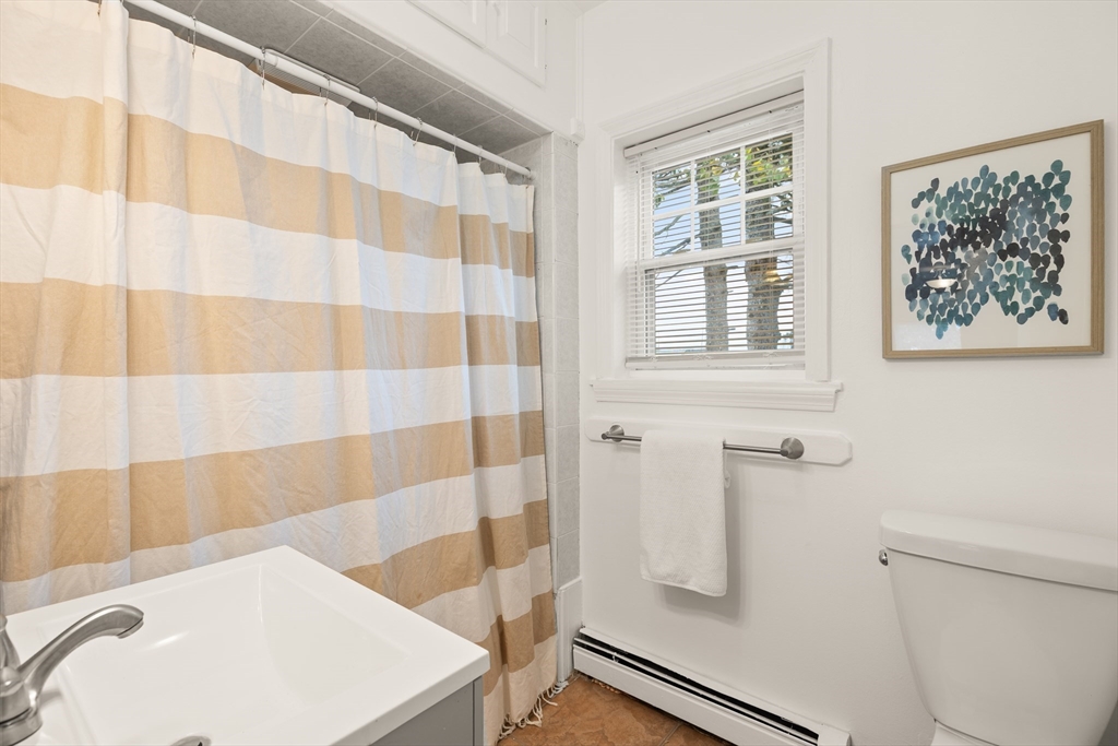 93 Bay State Road Methuen, MA 01844 - Photo 16 of 23 a bathroom with a sink and a shower