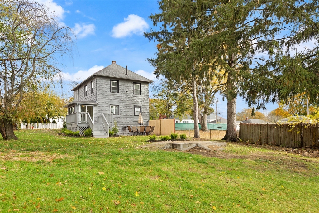 93 Bay State Road Methuen, MA 01844 - Photo 18 of 23 a big house with a big yard and large trees