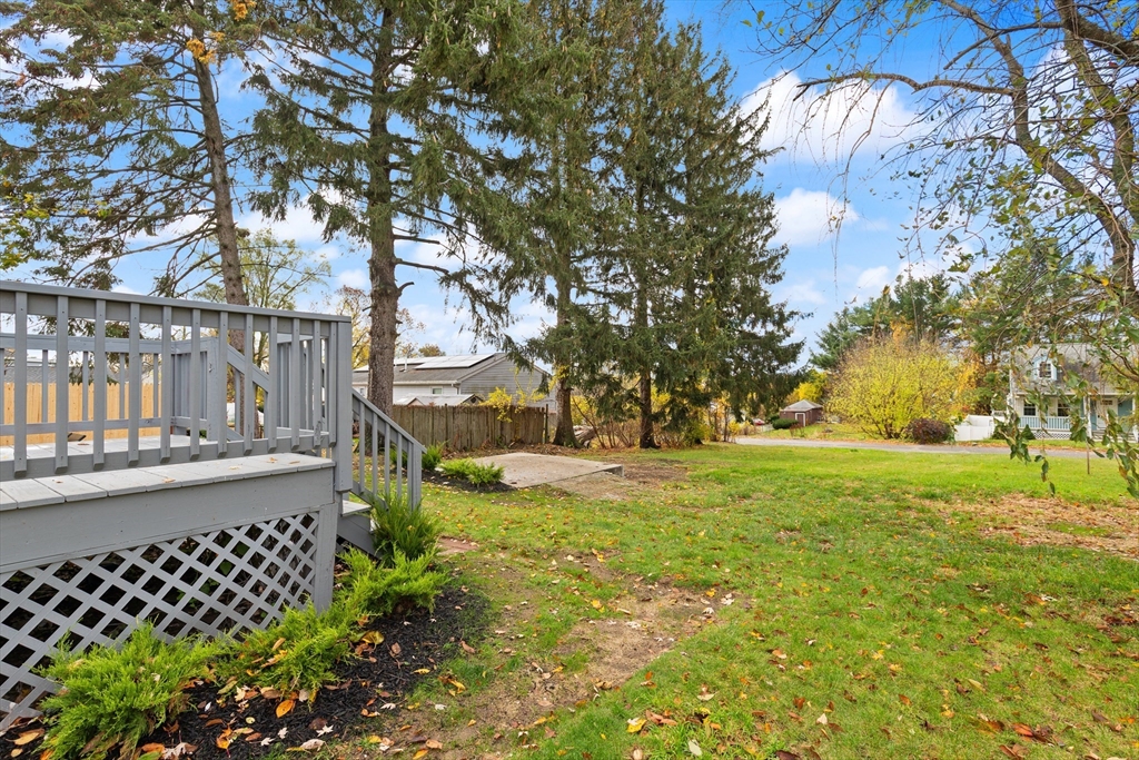 93 Bay State Road Methuen, MA 01844 - Photo 19 of 23 a view of a yard with yellow and trees