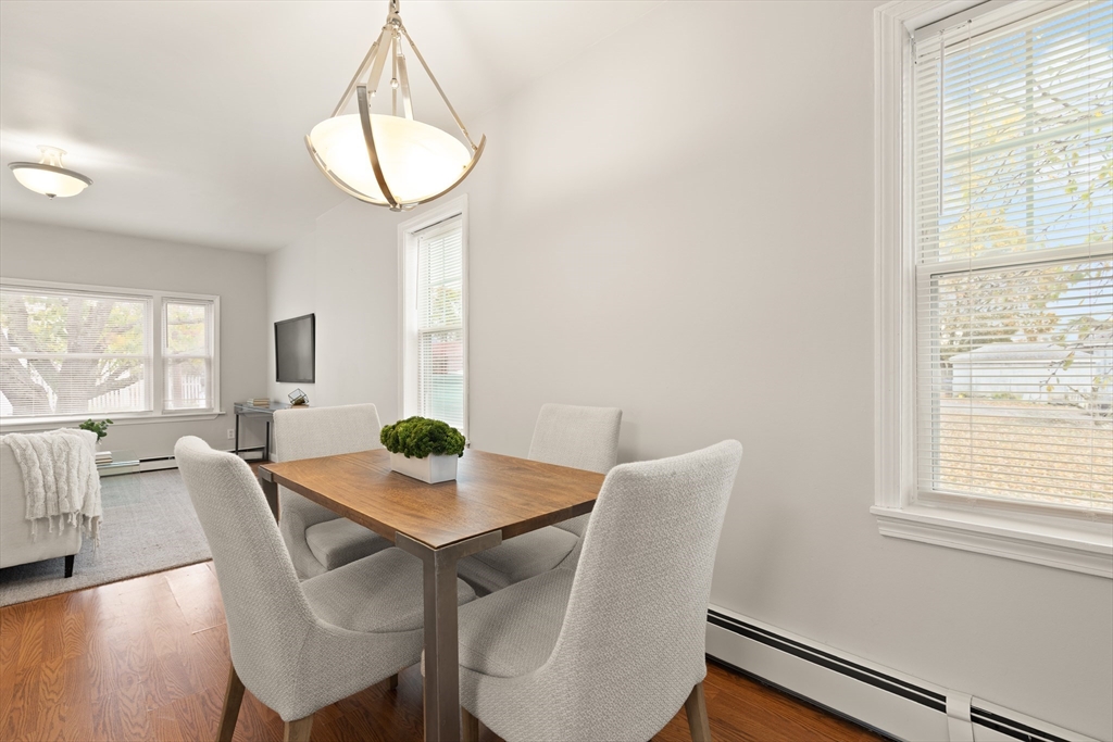 93 Bay State Road Methuen, MA 01844 - Photo 10 of 23 a view of a dining room with furniture window and wooden floor