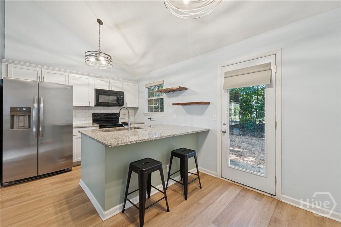 7206 Garfield Street Savannah, GA 31406 - Photo 12 of 29 Custom eat in kitchen island