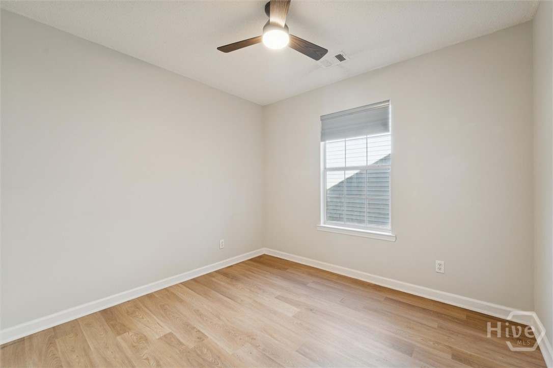 7206 Garfield Street Savannah, GA 31406 - Photo 25 of 29 Middle guest room window faces side of home