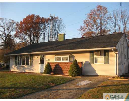 122 Winthrop Road Edison, NJ 08817 - Photo 1 of 14 a view of a house with backyard