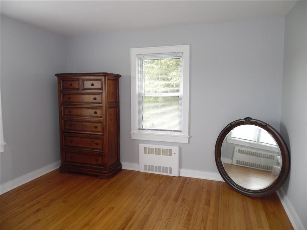 105 Dr Duggan Road Bethel, NY 12720 - Photo 22 of 29 Unfurnished room featuring light hardwood / wood-style flooring and radiator