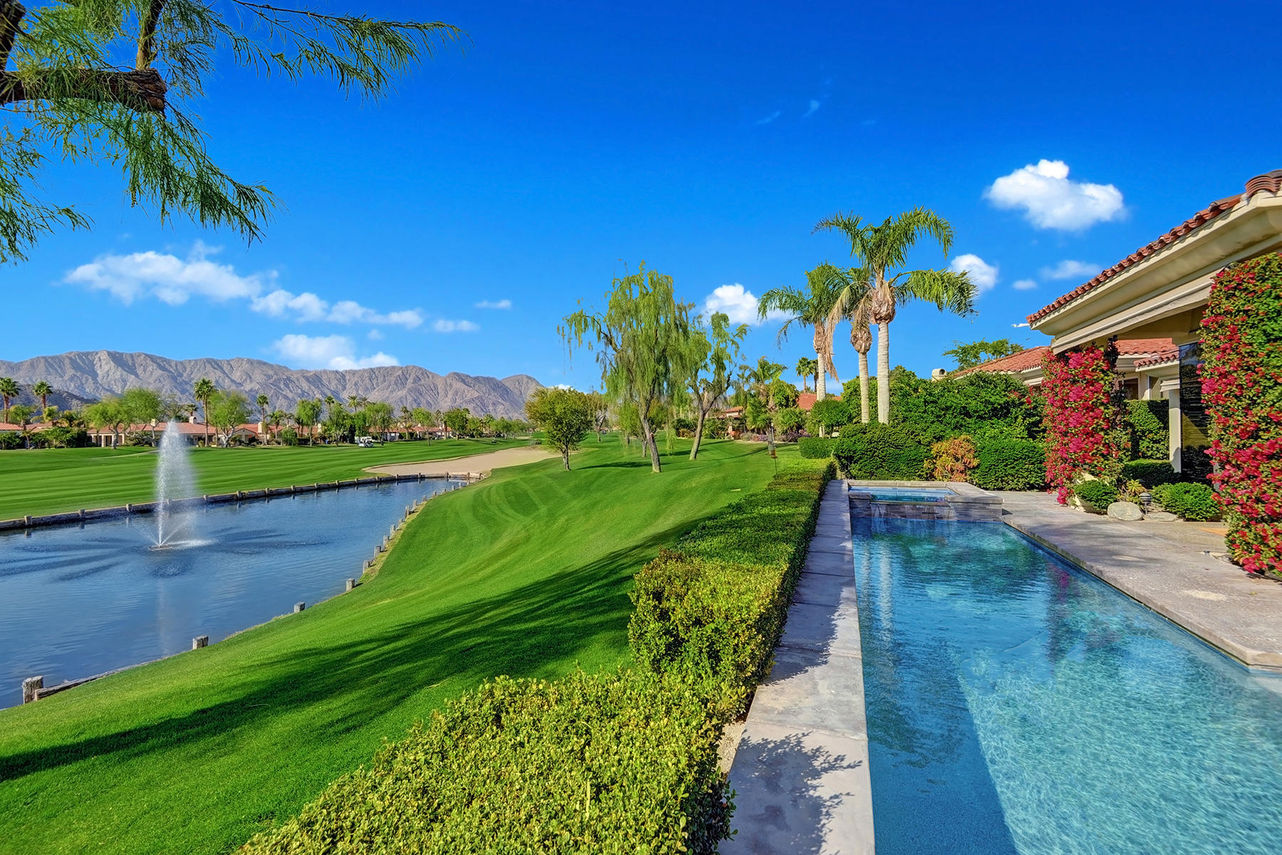 79593 Pomo La Quinta, CA 92253 - Photo 11 of 39 OVER POOL TO LAKE VIEW