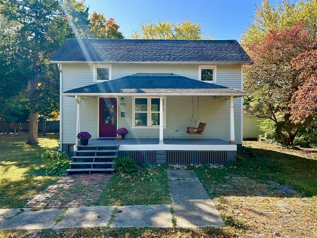 front view of a house with a yard