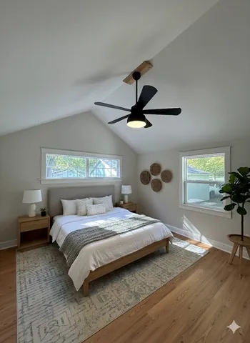 a view of an empty room and wooden floor