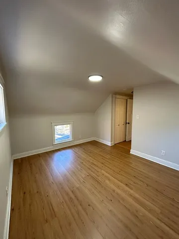a bathroom with a shower and vanity