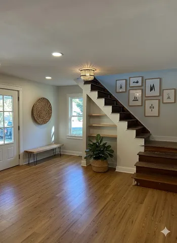 a bedroom with a bed and lamp potted plant