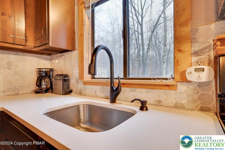 3176 Cherry Ridge Road Bushkill, PA 18324 - Photo 13 of 37 a kitchen with a sink and a window
