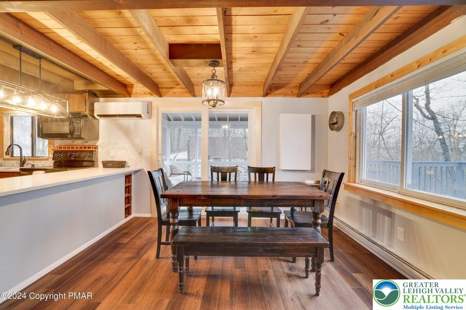 3176 Cherry Ridge Road Bushkill, PA 18324 - Photo 15 of 37 a view of a dining room with furniture window and outside view