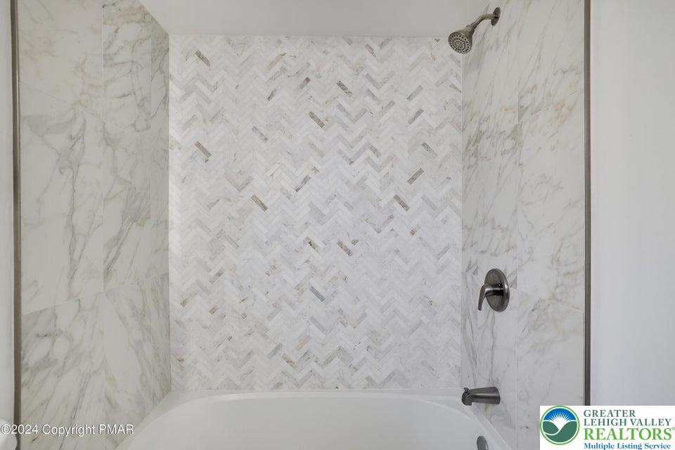 3176 Cherry Ridge Road Bushkill, PA 18324 - Photo 17 of 37 a bathroom with a shower
