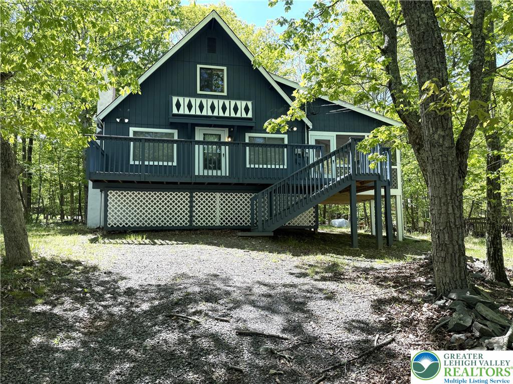 3176 Cherry Ridge Road Bushkill, PA 18324 - Photo 2 of 37 a front view of a house with a yard