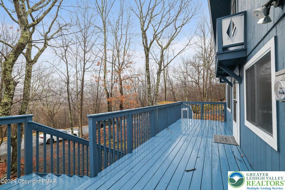 3176 Cherry Ridge Road Bushkill, PA 18324 - Photo 31 of 37 a view of deck with wooden floor and fence