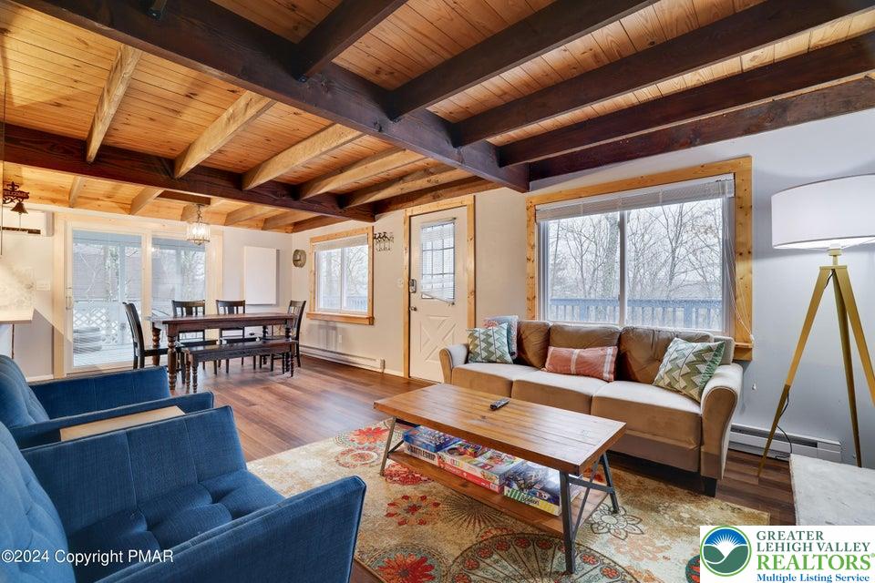 3176 Cherry Ridge Road Bushkill, PA 18324 - Photo 4 of 37 a living room with furniture and a large window