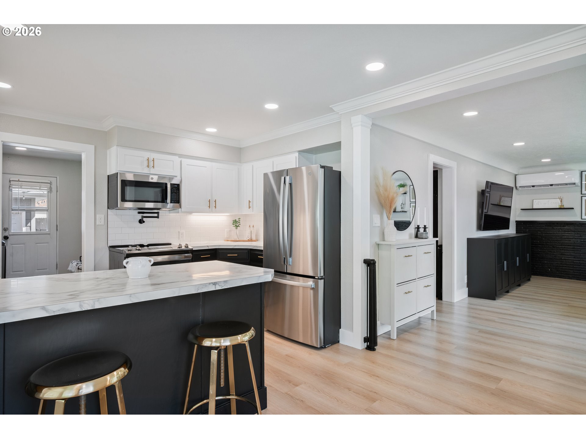 2808 Lilac Street Longview, WA 98632 - Photo 8 of 29 a kitchen with stainless steel appliances a refrigerator stove microwave and sink