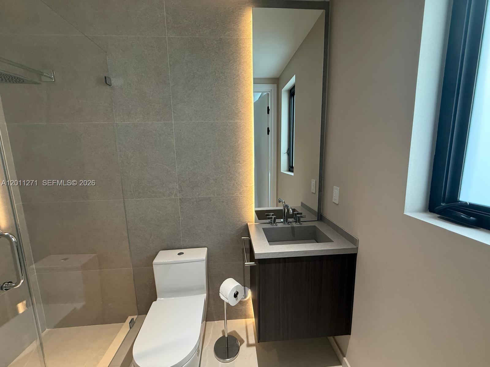 125 Southwest 29th Road Miami, FL 33129 - Photo 38 of 45 a bathroom with a sink and toilet