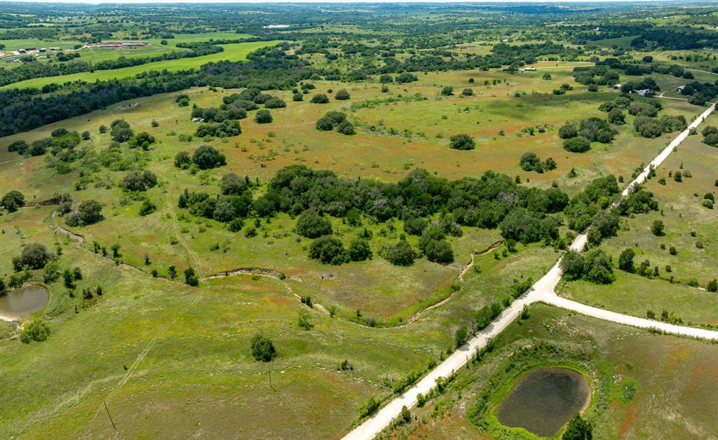Lot 2 County Road 277 Dublin, TX 76446 - Photo 2 of 6 an aerial view of residential houses with outdoor space