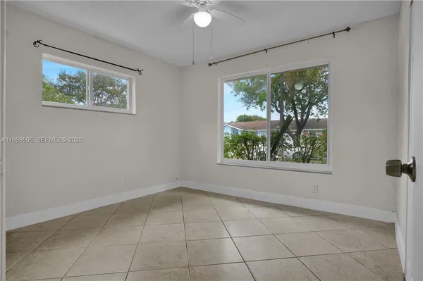 a bathroom with a bathtub a toilet and a shower