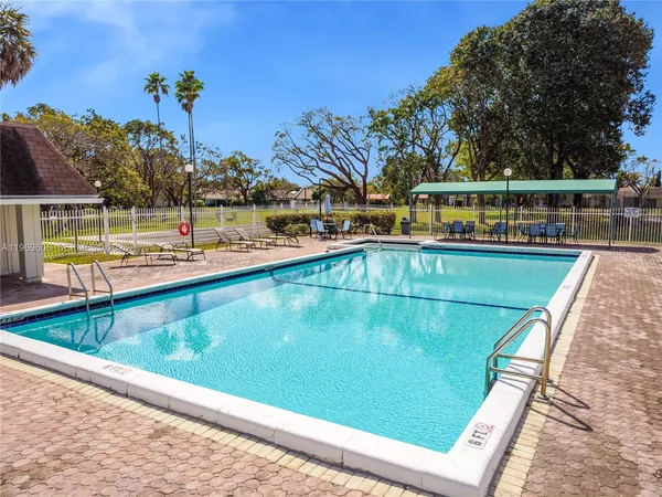 a view of a house with a swimming pool
