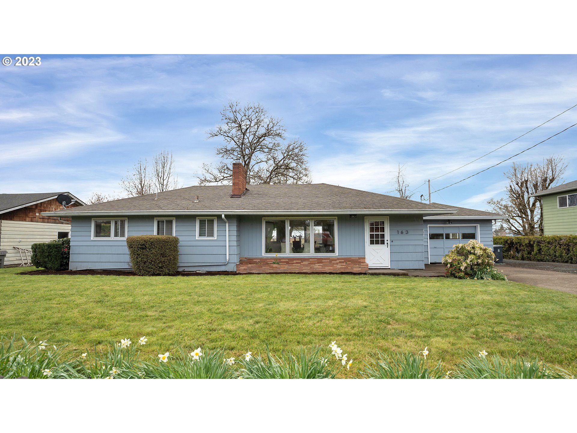 163 Northwest Reed Lane Dallas, OR 97338 - Photo 1 of 30 a black and white photo of a house