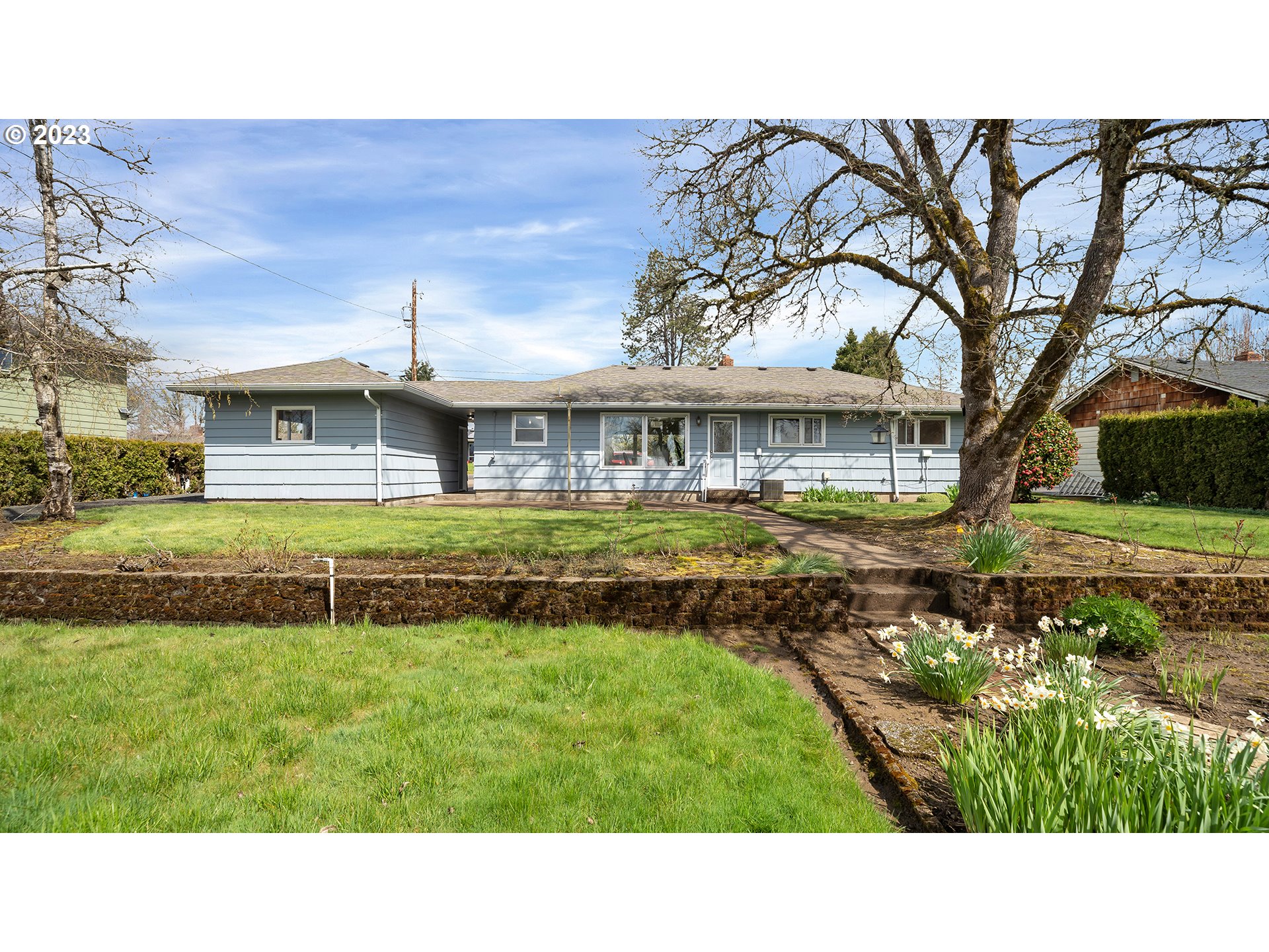 163 Northwest Reed Lane Dallas, OR 97338 - Photo 26 of 30 a view of house with a big yard