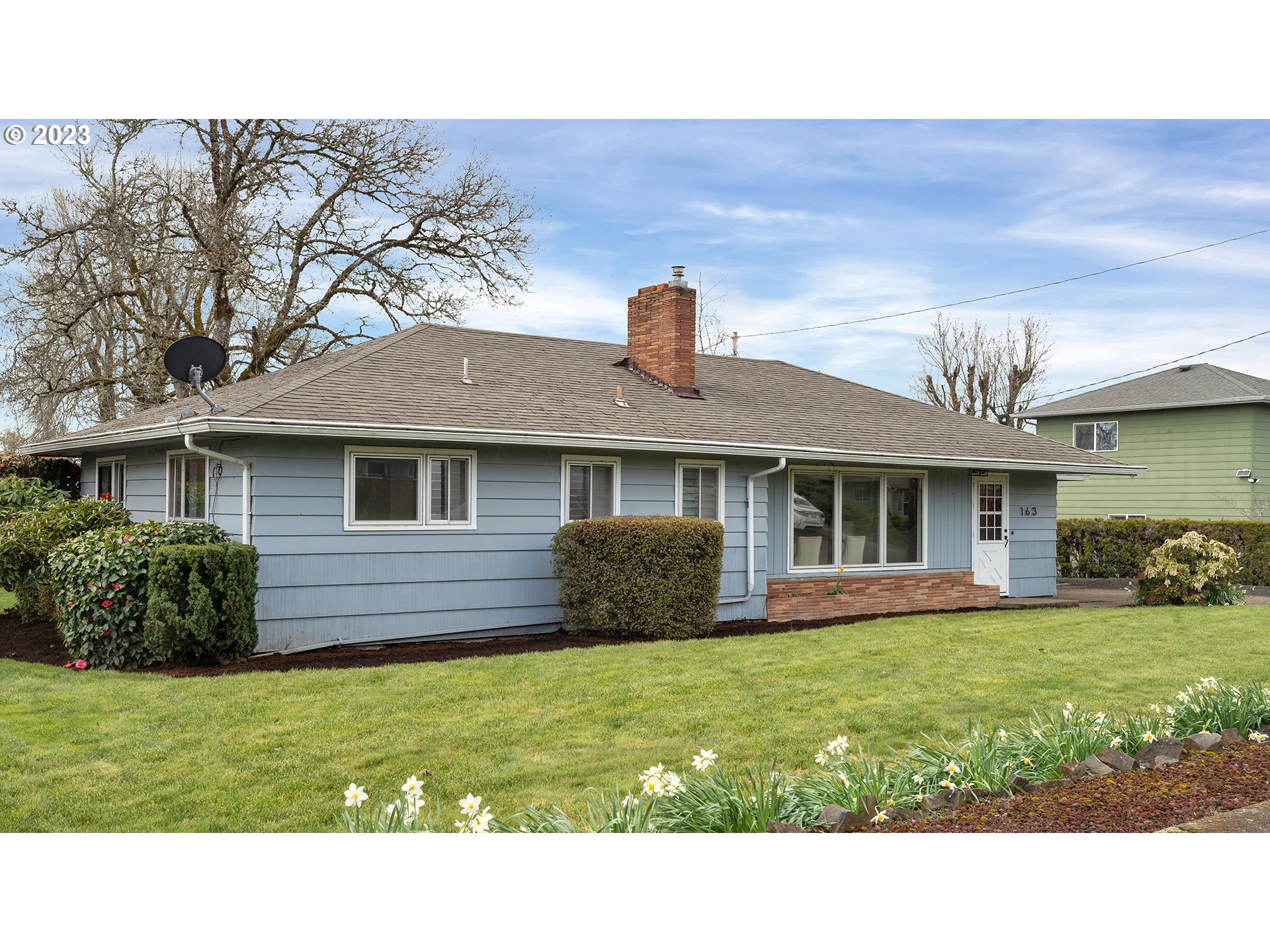 163 Northwest Reed Lane Dallas, OR 97338 - Photo 3 of 30 a view of a house with a backyard