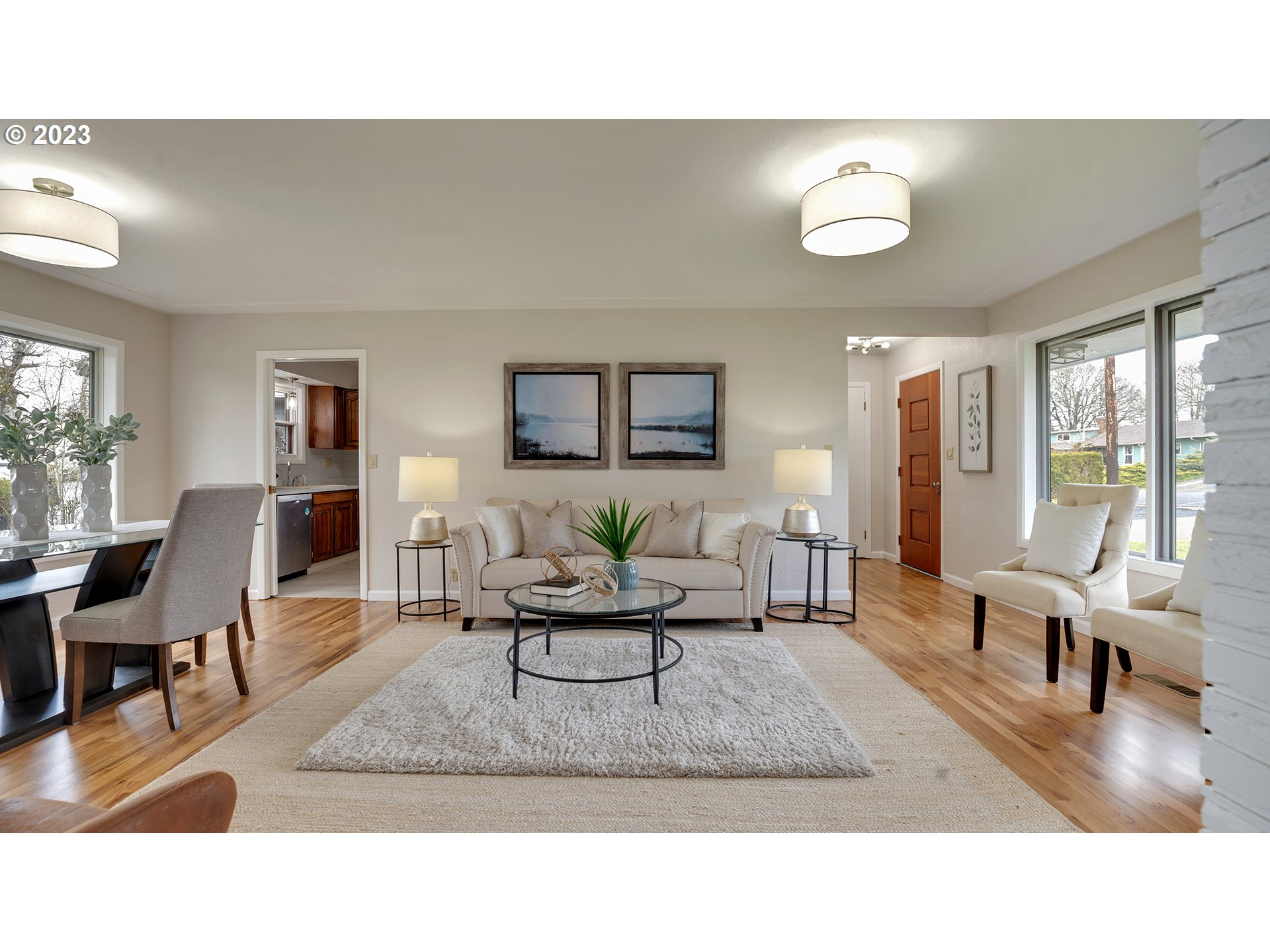 163 Northwest Reed Lane Dallas, OR 97338 - Photo 6 of 30 a living room with furniture and a large window