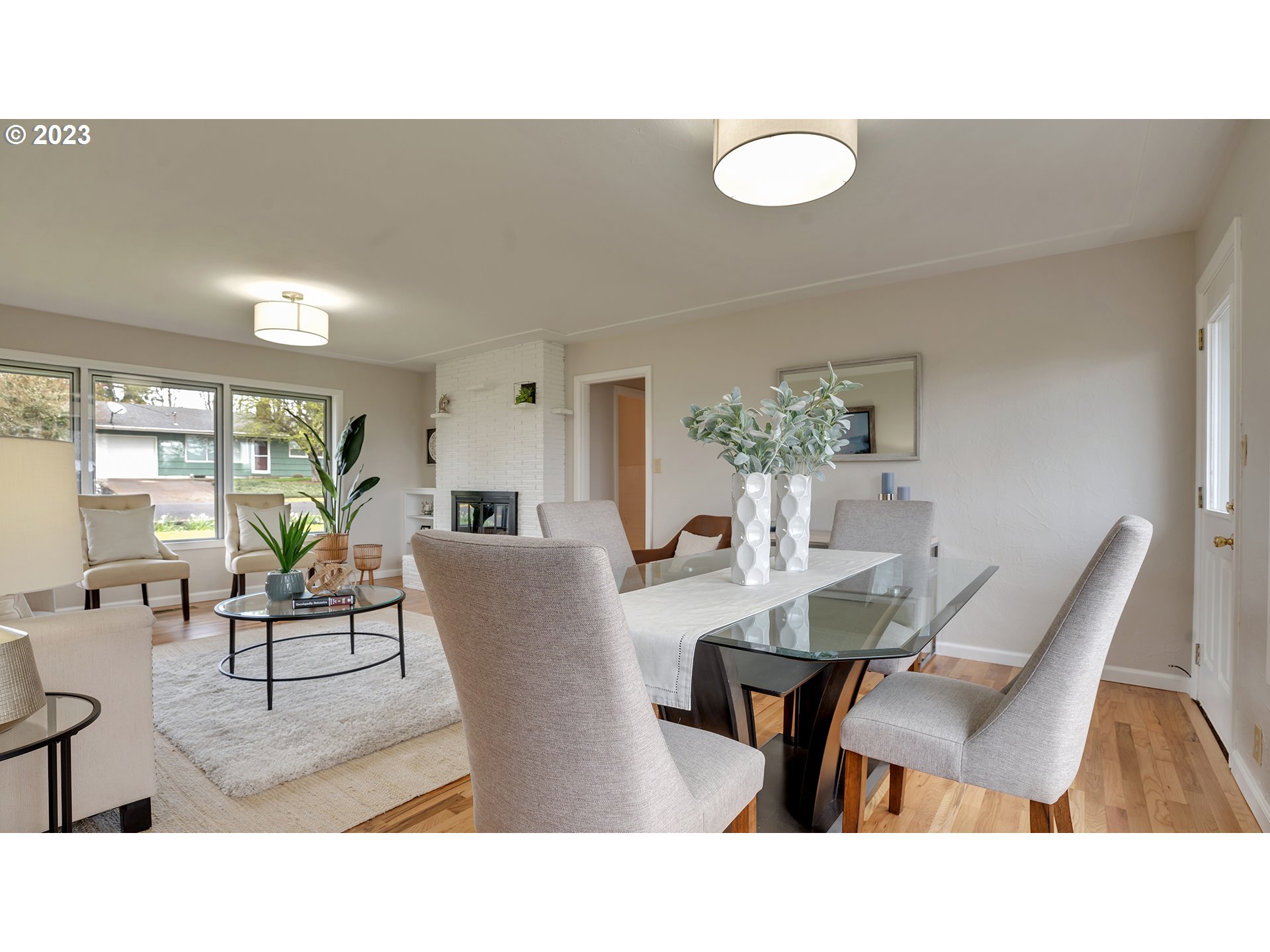 163 Northwest Reed Lane Dallas, OR 97338 - Photo 7 of 30 a living room with furniture and a table