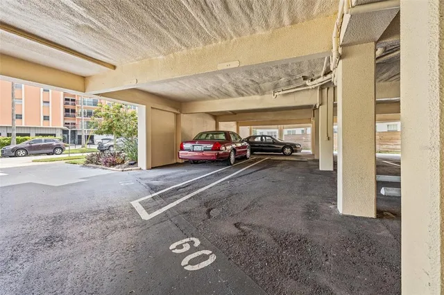 a view of a chairs and table in patio