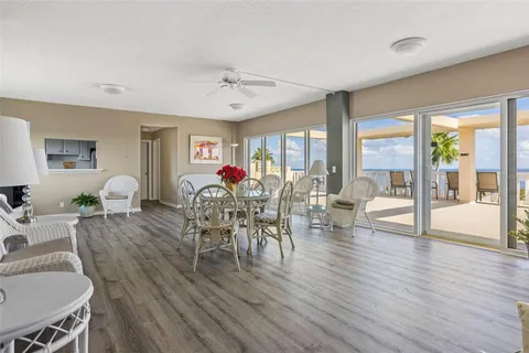 a utility room with cabinets washer and dryer