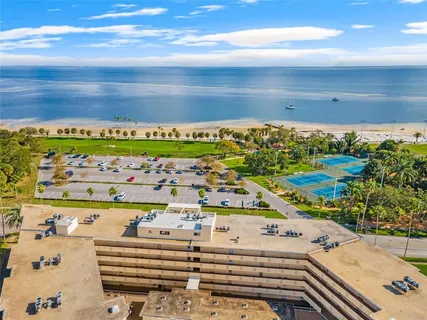 a view of a swimming pool with an ocean view