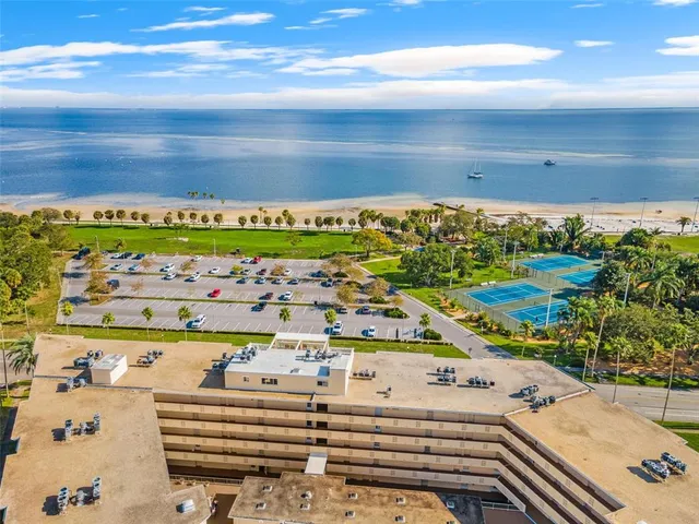 a view of a swimming pool with an ocean view