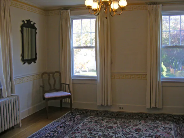 a room that has a bed and a window