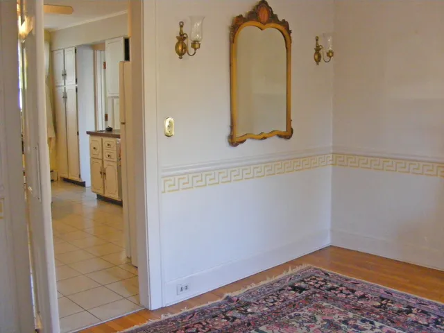 a living room with a wooden floor