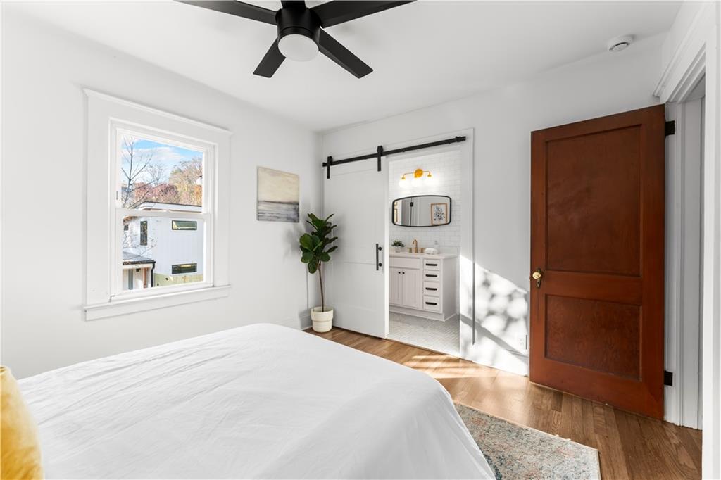 845 Ormewood Terrace Southeast, Unit A Atlanta, GA 30316 - Photo 11 of 34 a bedroom with a bed and a dresser