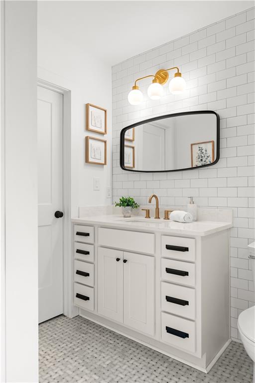 845 Ormewood Terrace Southeast, Unit A Atlanta, GA 30316 - Photo 13 of 34 a bathroom with a sink mirror and vanity