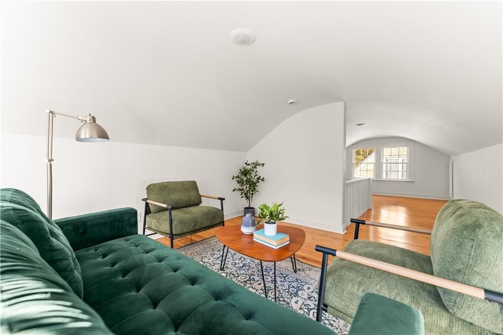 845 Ormewood Terrace Southeast, Unit A Atlanta, GA 30316 - Photo 19 of 34 a living room with furniture and a table